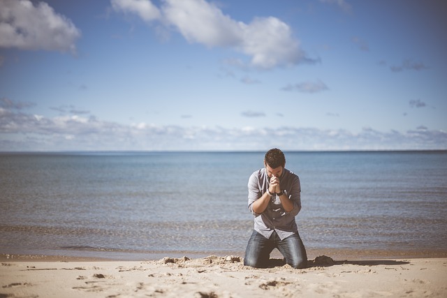 Electronic-Component-Supply-Chain-Issues_man-praying-at-shore