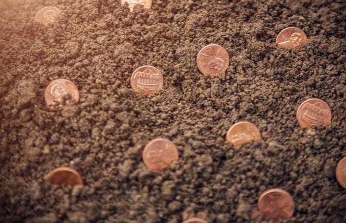 Copper shortage 2024 - Image showing pennies buried in ground